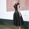 Black open back evening or cocktail midi dress with cap short sleeves, hand embellished , made in France