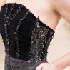 Strapless midi length black evening bustier dress