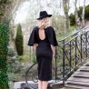 View of the back of hand embroidered Butterfly sleeves midi black evening or cocktail dress