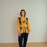 Model wearing hand-embellished mustard jacket – elegant evening outfit Model wearing hand-embellished mustard jacket – elegant evening outfit