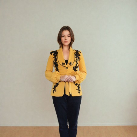 Model wearing hand-embellished mustard jacket – elegant evening outfit, front view