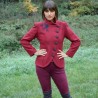 Custom red wool jacket, asymmetrical front, suitable as outer coat or office-ready wear.
