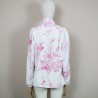 Blouse blanche loose avec col montant et nœud lavallière à nouer  à manches bouffantes. Fabrication française