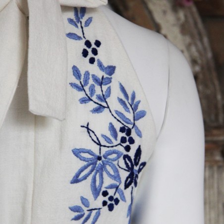 Detailed view of halter neckline with hand-sewn details