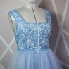 Unique one-of-a-kind handmade white dress on mannequin