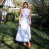Elegant summer wedding dress with halter straps and flowy skirt
