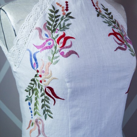 Close-up of linen fabric and halter neckline detail
