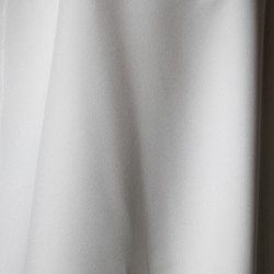 Handmade French bridal wear showing fine stitching and fabric detail