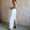 Back view of lace sheath wedding dress with halter neck, showcasing elegant open-back design.