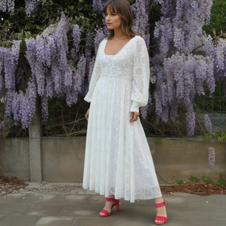 Full front view of the lace wedding midi dress, showcasing the open-back silhouette and flowing balloon sleeves.