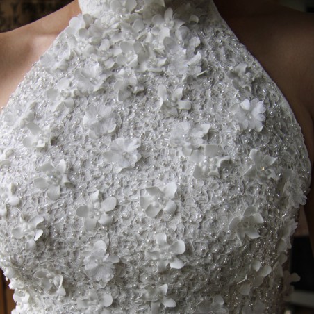 Floor-length sheath wedding dress with halter neckline and train