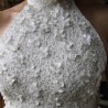 Floor-length sheath wedding dress with halter neckline and train