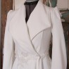 Elegant bridal gown with shawl collar and wrap-style silhouette