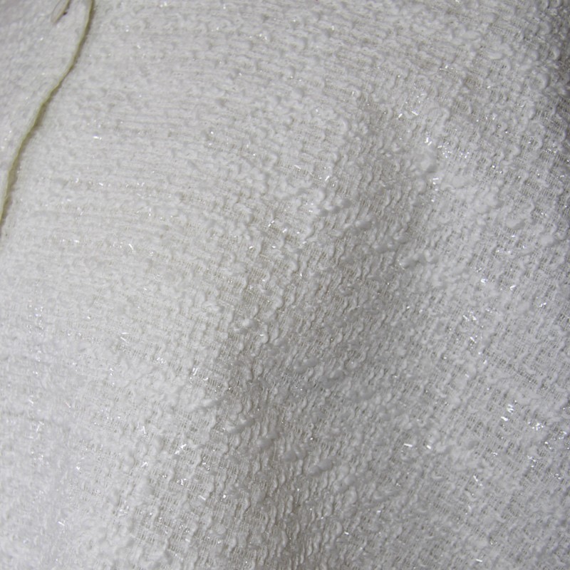 Gros plan de la texture du tissu tweed de la cape