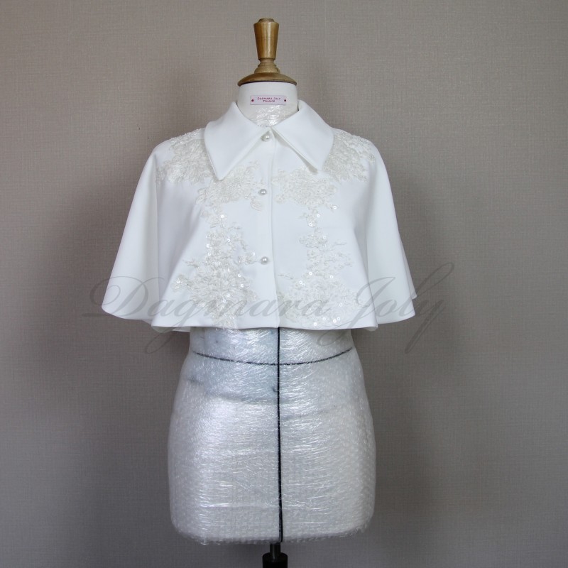 Handmade wedding dress cape featuring lace, transparent sequins, and luxurious crystal decorations.
