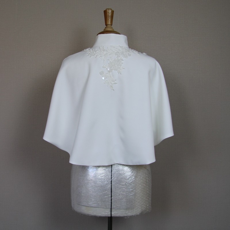 Back of the Bridal capelet with intricate hand-sewn embellishments.