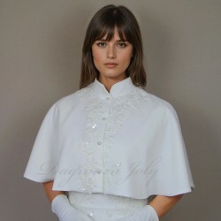 full view of Fine beadwork and embroidery captured in close detail on short crepe cape.
