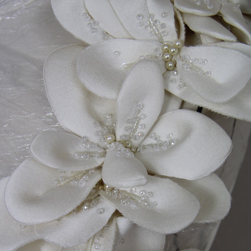 Fine couture stitching and seam detail on floor-length tube wedding dress made in France