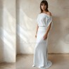 Front profile of sheath wedding gown showing train and form-fitting shape