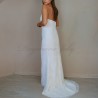 Back view of a modest halter neck lace wedding gown, capturing the dress’s backless details