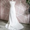 Back view showing elegant train of minimalist bridal gown