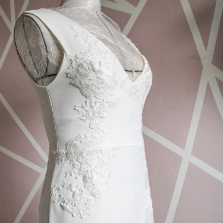 Side Close-up of hand embellishments on minimalist crepe bridal gown