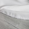 Close-up of hand embellishments on ourlet of minimalist floor length crepe bridal gown