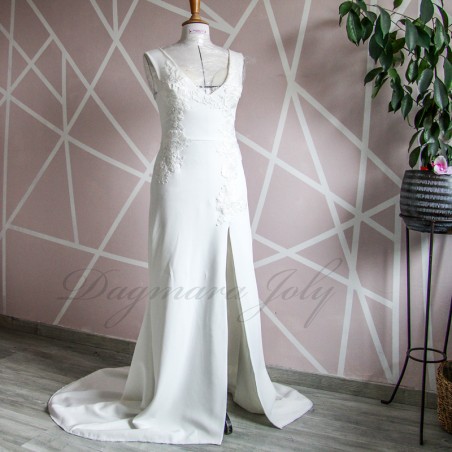 Modern elegant bridal gown handmade in France with train