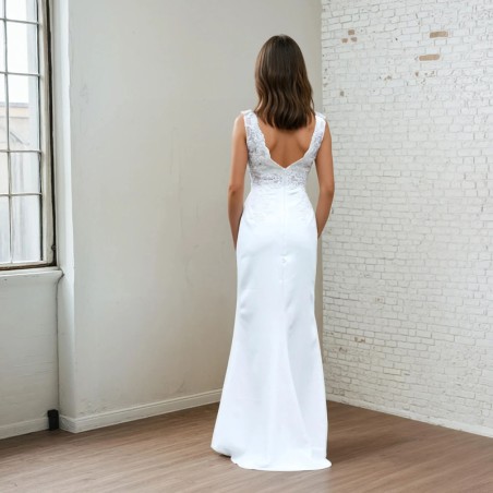 Back view of V-back wedding dress with lace and crystal embellishments
