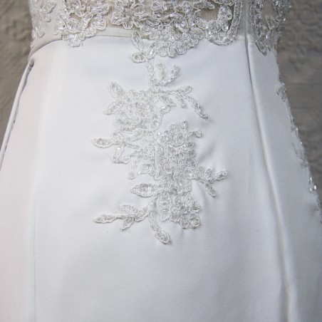 Back detail with delicate lace and crystal accents