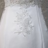 Back detail with delicate lace and crystal accents