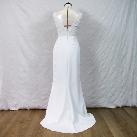 Back view of Beaded long wedding dress on mannequin – high slit bridal gown made in France