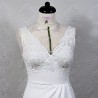 Luxury beaded lace wedding gown on dummy – plunging neckline and thigh slit