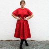 Manteau rouge en laine pour femme, brodé à la main, 100 % laine, longueur sous le genou.