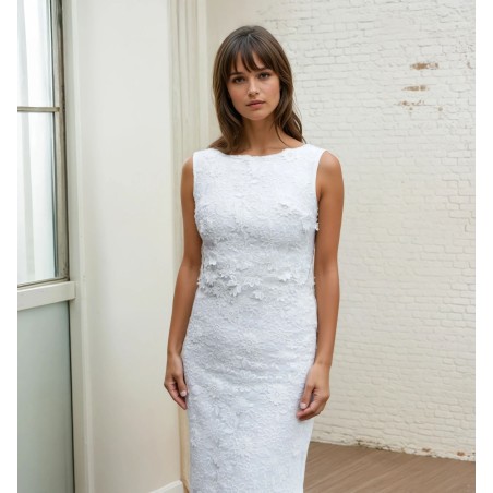 Texture fine de la dentelle de coton de haute qualité sur une robe de mariée sur mesure.