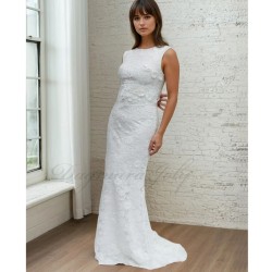 Front profile of a bride in a floor-length sheath lace dress