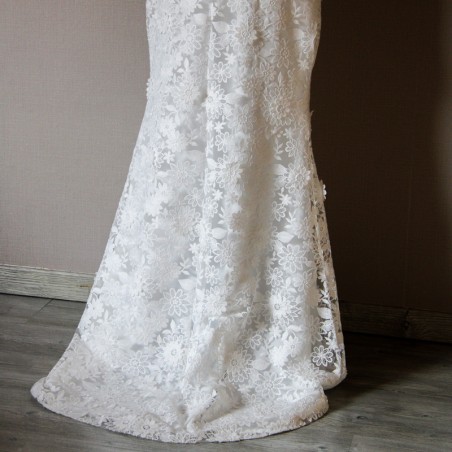Floor-length sheath wedding dress with boat neckline and train