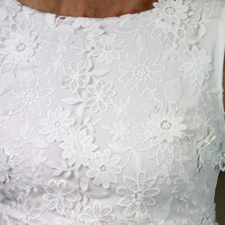 Floor-length sheath wedding dress with boat neckline and train