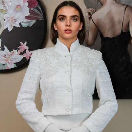 Luxury white tweed jacket with long sleeves and decorative lace details