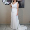 Full view of bridal gown with back train, square neckline and V at the back