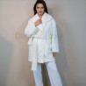Full view of model wearing short ivory warm winter bride coat