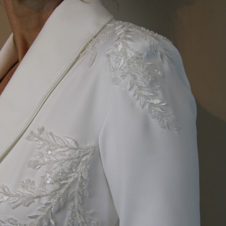 Close-up of couture beadwork on handmade bridal pantsuit