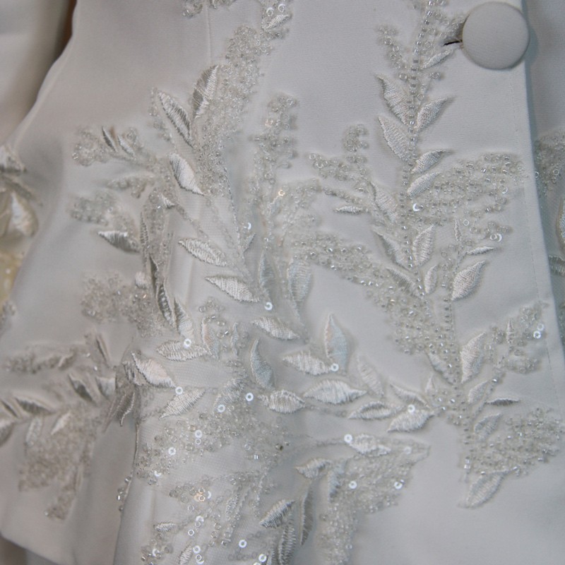 Close-up of couture beadwork on handmade bridal pantsuit
