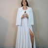 Model is wearing long linen romantic hand embroidered dress