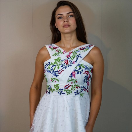 Zoom on hand embroidered colorful floral design