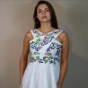 Zoom on hand embroidered colorful floral design