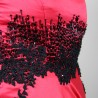 hand embroidery and hand applied pearls on red evening dress