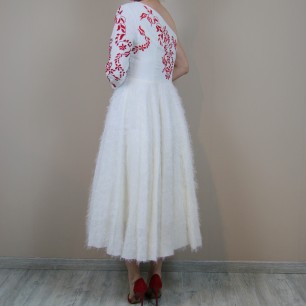 View of the back of midi hand embroidered wedding dress