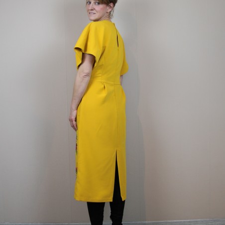 Back view of hand-embroidered pencil midi dress