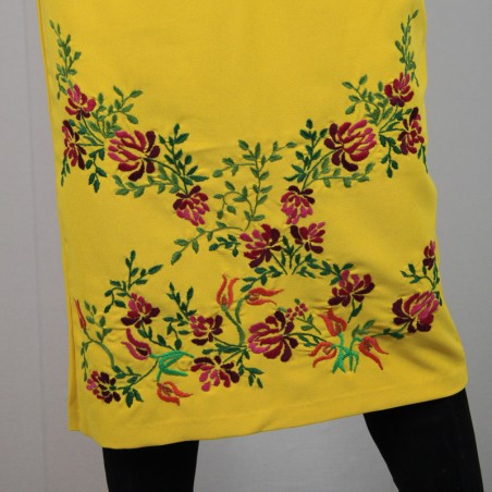 Close-up of hand embroidery on pencil midi dress